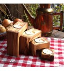 Set of 4 modern candle holders out of olive wood
