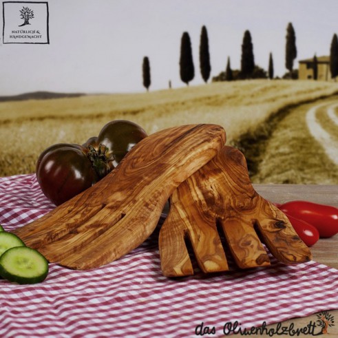 modern salald hands out of olive wood