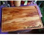 Large chopping board of olive wood with juice groove